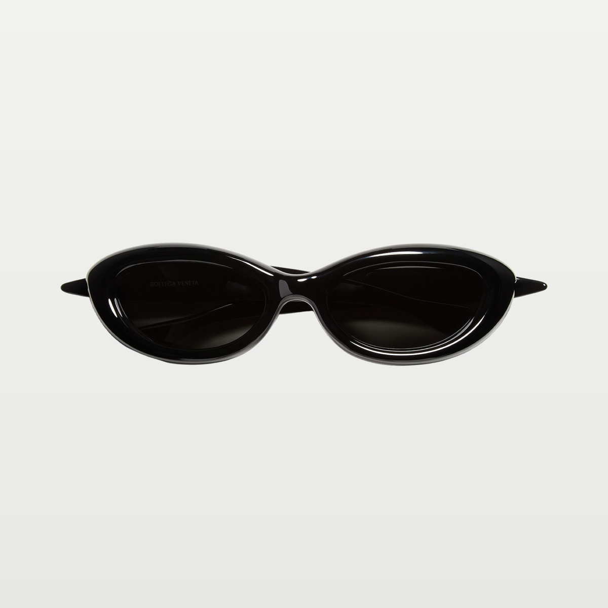 Bottega Veneta Sardine Oval Sunglasses in Black/gray