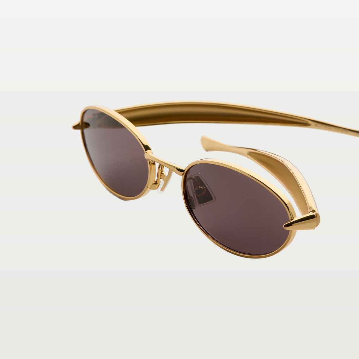 Bottega Veneta Sardine Oval Sunglasses in Gold/grey